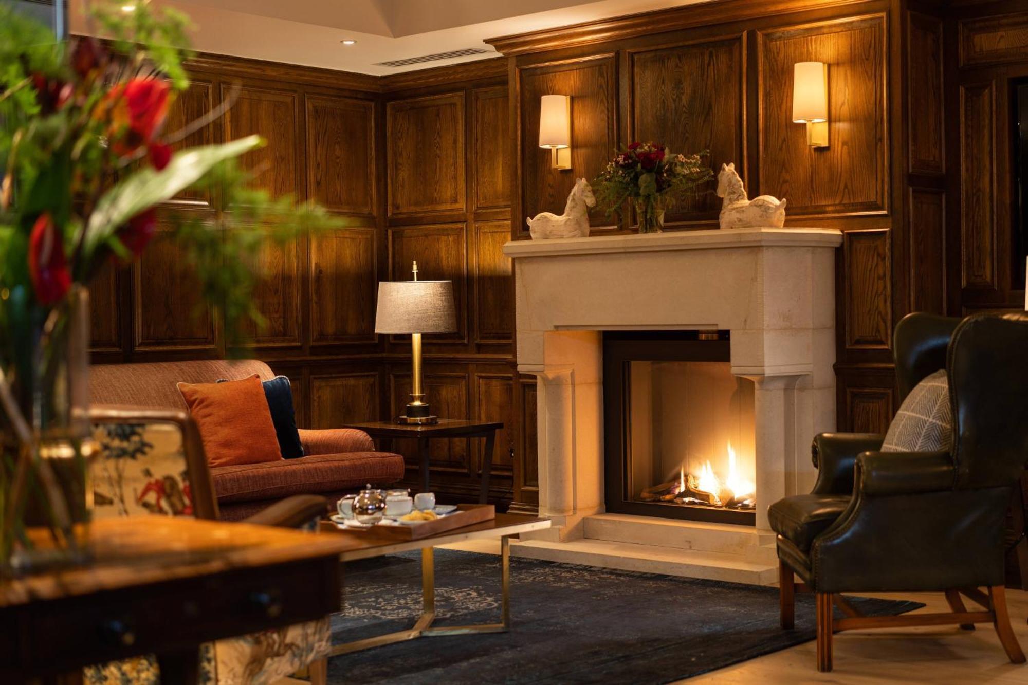 Mount Juliet Estate, Autograph Collection Hotell Thomastown  Exteriör bild The fireplace in the hotel's lobby